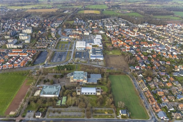 Aerial view commercial area Ostwennemarstraße and MaxiCenter and Freiherr-vom-Stein-Gymnasium in Hamm, Ruhr area, North Rhine-Westphalia, Germany, DE, shopping, shopping markets, shopping place, shopping centre, Europe, commercial enterprises, commercial area, commercial location, Hamm, roundabout, aerial view, aerial photograph, aerial photography, aerial photography, Rhine-Ruhr metropolitan region, local supply centre, shopping centre, overview, bird's-eye view, overview