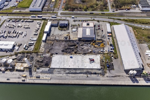 Aerial view, industrial estate harbour, construction site Lanfer site, loading terminal, Datteln-Hamm canal, Herringen, Hamm, Ruhr area, North Rhine-Westphalia, Germany, construction work, construction area, building site, building plots, construction project, construction site, DE, Europe, commercial area, industrial estate, industrial park, commercial use, industrial facilities, industrial area, industrial site, canal, Lanfer Logistik, aerial photograph, aerial photography, aerial photography, production plants, production halls, overview, bird's eye view, birds-eyes view, overview