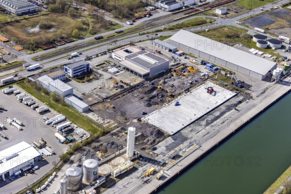 Aerial view, industrial estate harbour, construction site Lanfer site, loading terminal, Datteln-Hamm canal, Herringen, Hamm, Ruhr area, North Rhine-Westphalia, Germany, construction work, construction area, building site, building plots, construction project, construction site, DE, Europe, commercial area, industrial estate, industrial park, commercial use, industrial facilities, industrial area, industrial site, canal, Lanfer Logistik, aerial photograph, aerial photography, aerial photography, production plants, production halls, overview, bird's eye view, birds-eyes view, overview