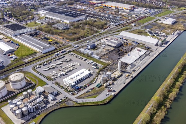 Aerial view, industrial estate harbour, construction site Lanfer site, loading terminal, Datteln-Hamm canal, Herringen, Hamm, Ruhr area, North Rhine-Westphalia, Germany, construction work, construction area, building site, building plots, construction project, construction site, DE, Europe, commercial area, industrial estate, industrial park, commercial use, industrial facilities, industrial area, industrial site, canal, Lanfer Logistik, aerial photograph, aerial photography, aerial photography, production plants, production halls, overview, bird's eye view, birds-eyes view, overview