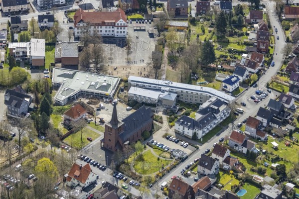Aerial view, construction site and new building Haus der Begegnung für die Gemeinde und die Ganztagsschule, Caritas-Altenheim St. Josef, Kath. Kirche Heilig Kreuz, Herringen, Hamm, Ruhr Area, North Rhine-Westphalia, Deutschland, Altenheim, Altenwohnheim, Altersheim, An den Kirchen, Andachtstätte, Betreuung und Pflege, Bildung, Bildungseinrichtung, DE, Europa, Glaubensgemeinschaft, Gotteshaus, Grundschule, Heilige Stätte, Kath. parish of St. Peter and Paul, church, parish, denomination, educational institute, aerial photography, aerial photography, OGS, care facility, religion, religious site, school, retirement home, retirement residence, retirement home, retirement centre, overview, bird's eye view, birds-eyes view, overview
