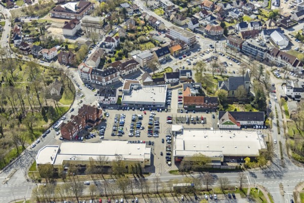 Aerial view, Lippecarree shopping centre at Herringer Markt, Evangelical St. Victor Church, Herringen, Hamm, Ruhr area, North Rhine-Westphalia, Germany, place of worship, DE, shopping centre, shopping place, shopping mall, Europe, religious community, place of worship, holy place, church, church community, denomination, aerial view, aerial photography, aerial photography, local supply centre, religion, religious site, shopping centre, overview, bird's-eye view, overview