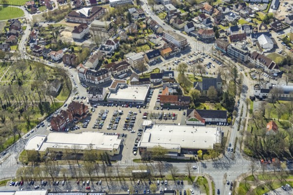 Aerial view, Lippecarree shopping centre at Herringer Markt, Evangelical St. Victor Church, Herringen, Hamm, Ruhr area, North Rhine-Westphalia, Germany, place of worship, DE, shopping centre, shopping place, shopping mall, Europe, religious community, place of worship, holy place, church, church community, denomination, aerial view, aerial photography, aerial photography, local supply centre, religion, religious site, shopping centre, overview, bird's-eye view, overview