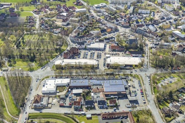 Aerial view, Lippecarree shopping centre at Herringer Markt, Evangelical St. Victor Church, Herringen, Hamm, Ruhr area, North Rhine-Westphalia, Germany, place of worship, DE, shopping centre, shopping place, shopping mall, Europe, religious community, place of worship, holy place, church, church community, denomination, aerial view, aerial photography, aerial photography, local supply centre, religion, religious site, shopping centre, overview, bird's-eye view, overview