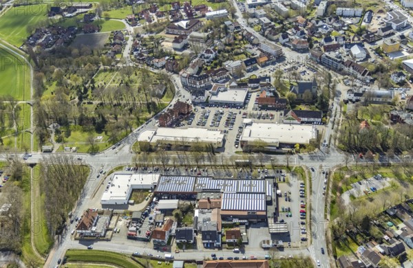 Aerial view, Lippecarree shopping centre at Herringer Markt, Evangelical St. Victor Church, Herringen, Hamm, Ruhr area, North Rhine-Westphalia, Germany, place of worship, DE, shopping centre, shopping place, shopping mall, Europe, religious community, place of worship, holy place, church, church community, denomination, aerial view, aerial photography, aerial photography, local supply centre, religion, religious site, shopping centre, overview, bird's-eye view, overview