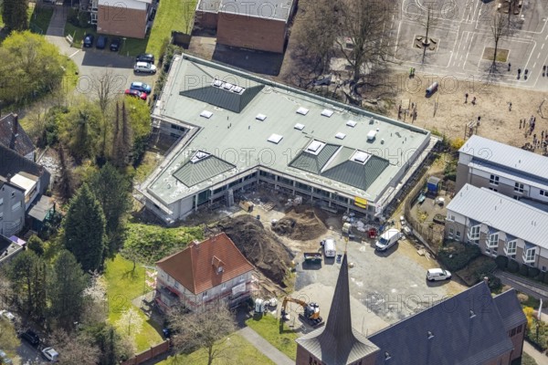 Aerial view, construction site and new building Haus der Begegnung für die Gemeinde und die Ganztagsschule, Caritas-Altenheim St. Josef, Herringen, Hamm, Ruhr Area, North Rhine-Westphalia, Deutschland, Altenheim, Altenwohnheim, Altersheim, An den Kirchen, Betreuung und Pflege, Bildung, Bildungseinrichtung, DE, Europa, Grundschule, Kath. parish of St. Peter and Paul, educational institute, aerial photography, aerial photography, OGS, care facility, school, retirement home, retirement residence, retirement home, retirement centre, overview, bird's eye view, birds-eyes view, overview