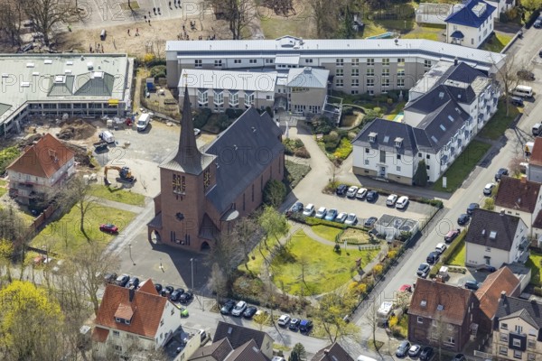 Aerial view, construction site and new building Haus der Begegnung for the parish and the all-day school, Caritas-Altenheim St. Josef, Kath. Church of the Holy Cross, Herringen, Hamm, Ruhr area, North Rhine-Westphalia, Germany, retirement home, retirement home, An den Kirchen, place of worship, construction work, building, construction area, building site, building plots, construction project, construction site, care and nursing, education, educational institution, DE, development, Europe, faith community, place of worship, primary school, property tax, holy place, real estate, capacity requirements, Kath. parish of St. Peter and Paul, church, parish, denomination, educational institute, aerial view, aerial photography, aerial photography, new building, OGS, care facility, religion, religious site, school, retirement home, retirement residence, retirement home, senior citizens' centre, overview, bird's eye view, growth, becoming and growing, residential complex, living and living, resi...
