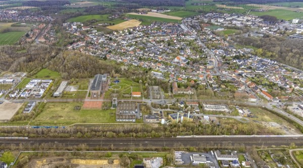 Aerial view, commercial area Ökozentrum Sachsenweg, Alfred-fisherman-Halle in Heessen, Hamm, Ruhr area, North Rhine-Westphalia, Germany, railway tracks, DE, Europe, commercial enterprises, commercial area, commercial park, commercial location, commercial use, industrial area, industrial building, industrial culture, industrial site, Keolis Deutschland GmbH, aerial view, aerial photography, aerial photography, SMT Scharf AG, Sondermann-Brot Bäckerei, overview, event location, event venue, event centre, bird's-eye view, forest area, birds-eyes view, overview, Öko-Zentrum North Rhine-Westphalia