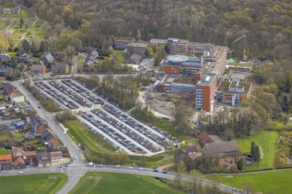 Aerial view, construction site at the St. Barbara Clinic in Heessen, Hamm, Ruhr area, North Rhine-Westphalia, Germany, construction work, construction area, construction site, building plots, construction project, construction site, DE, Europe, healthcare, hospital, helipad, clinic, hospital centre, hospital, aerial photograph, aerial photography, aerial photography, medical facility, medical aid, new building, emergency service, car parks, overview, bird's eye view, birds-eyes view, overview, medical care