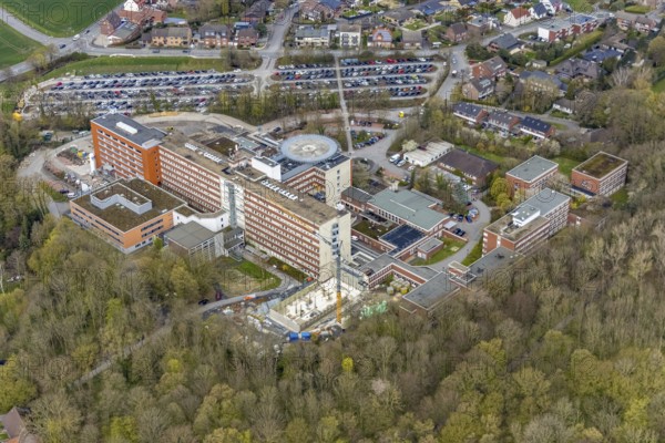 Aerial view, construction site at the St. Barbara Clinic in Heessen, Hamm, Ruhr area, North Rhine-Westphalia, Germany, construction work, construction area, construction site, building plots, construction project, construction site, DE, Europe, healthcare, hospital, helipad, clinic, hospital centre, hospital, aerial photograph, aerial photography, aerial photography, medical facility, medical aid, new building, emergency service, car parks, overview, bird's eye view, birds-eyes view, overview, medical care