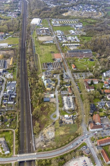Aerial view, commercial area Ökozentrum Sachsenweg, Alfred-fisherman-Halle in Heessen, Hamm, Ruhr area, North Rhine-Westphalia, Germany, railway tracks, DE, Europe, commercial enterprises, commercial area, commercial park, commercial location, commercial use, industrial area, industrial building, industrial culture, industrial site, Keolis Deutschland GmbH, aerial view, aerial photography, aerial photography, SMT Scharf AG, Sondermann-Brot Bäckerei, overview, event location, event venue, event centre, bird's-eye view, forest area, birds-eyes view, overview, Öko-Zentrum North Rhine-Westphalia
