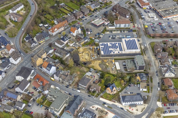 Aerial view, construction site Kleine Amtsstraße behind Aldi, Heessen, Hamm, Ruhr area, North Rhine-Westphalia, Germany, Aldi supermarket, construction work, construction area, construction site, building plots, construction crane, construction project, construction site, DE, Europe, aerial view, aerial photography, aerial photography, new construction, photovoltaic, photovoltaic system, solar, solar system, solar energy, solar energy, overview, bird's eye view, birds-eyes view, overview
