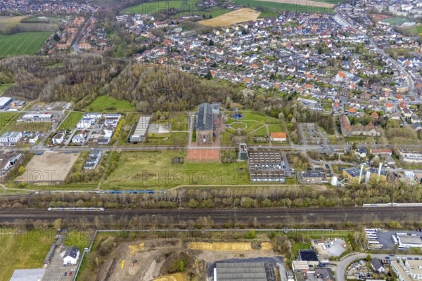 Aerial view, commercial area Ökozentrum Sachsenweg, Alfred-fisherman-Halle in Heessen, Hamm, Ruhr area, North Rhine-Westphalia, Germany, railway tracks, DE, Europe, commercial enterprises, commercial area, commercial park, commercial location, commercial use, industrial area, industrial building, industrial culture, industrial site, Keolis Deutschland GmbH, aerial view, aerial photography, aerial photography, SMT Scharf AG, Sondermann-Brot Bäckerei, overview, event location, event venue, event centre, bird's-eye view, forest area, birds-eyes view, overview, Öko-Zentrum North Rhine-Westphalia
