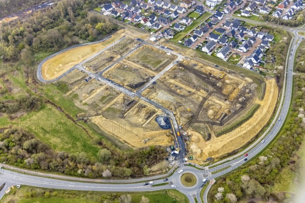 Aerial view, construction site and construction area Heimshof Ost am Sachsenring with housing estate in Heessen, Hamm, Ruhr area, North Rhine-Westphalia, Germany, construction work, construction, construction area, building site, building plots, construction project, construction site, DE, Europe, property tax, real estate, roundabout, roundabout, aerial view, aerial photography, aerial photography, metropolitan region Rhine-Ruhr, new construction, overview, bird's eye view, residential area, residential area, residential buildings, residential quality, residential neighbourhood, housing estate, birds-eyes view, overview