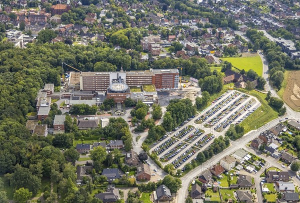 Aerial view, St. Barbara-Klinik Hamm-Heessen with extension construction site in the Heessen district, Hamm, Ruhr area, North Rhine-Westphalia, Germany, construction work, construction area, building site, building plots, construction project, construction site, DE, Europe, healthcare, hospital, helipad, clinic, clinic centre, hospital, hospital, aerial photograph, aerial photography, aerial photography, medical facility, medical aid, new building, car park, overview, bird's eye view, birds-eyes view, overview, medical care
