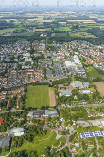 Aerial view, green area Werries with Freiherr-vom-Stein-Gymnasium Hamm, Westpress Arena and ice sports arena as well as access to Maximilianpark in Uentrop, Hamm, Ruhr area, North Rhine-Westphalia, Germany, education, educational institution, DE, ice sports, ice sports hall, Europe, grammar school, educational institute, aerial view, aerial photography, aerial photography, multifunctional hall, Ostwennemarstraße, park, school, overview, bird's eye view, birds-eyes view, overview