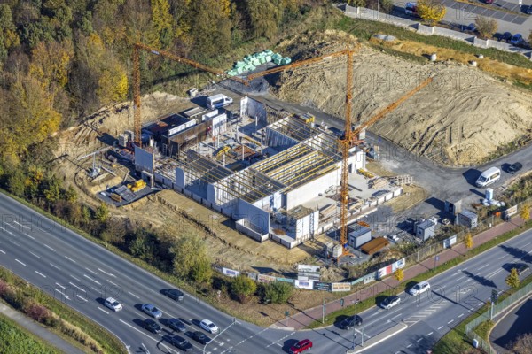 Aerial view, construction area and new building for Mensing Galerie corner Werler Straße and Unnaer Straße and in the district Rhynern in Hamm, Ruhr area, North Rhine-Westphalia, Germany, construction work, construction area, building site, building plots, construction project, construction site, DE, Europe, gallery, commercial enterprises, commercial area, commercial area, commercial location, commercial use, Hamm, culture, art, aerial view, aerial photography, aerial photography, new building, overview, bird's eye view, birds-eyes view, overview