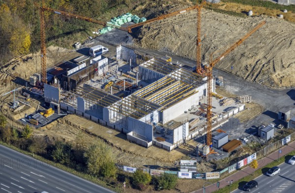 Aerial view, construction area and new building for Mensing Galerie corner Werler Straße and Unnaer Straße and in the district Rhynern in Hamm, Ruhr area, North Rhine-Westphalia, Germany, construction work, construction area, building site, building plots, construction project, construction site, DE, Europe, gallery, commercial enterprises, commercial area, commercial area, commercial location, commercial use, Hamm, culture, art, aerial view, aerial photography, aerial photography, new building, overview, bird's eye view, birds-eyes view, overview