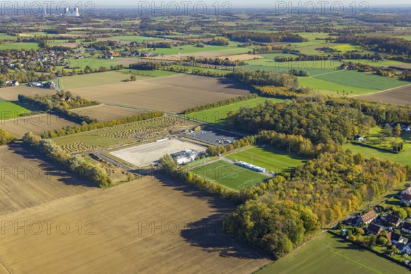 Aerial view, construction site and new sports field with stands and a club building with sports day care centre Papenloh An der Lohschule in the district Rhynern in Hamm, Ruhr area, North Rhine-Westphalia, Germany, Am Sportplatz, construction work, construction area, construction site, building plots, construction project, construction site, DE, Europe, Hamm, aerial view, aerial photography, aerial photography, SV Westfalia Rhynern, sports, sports facilities, sports field, sports facility, Tünner Berg, overview, bird's-eye view, overview