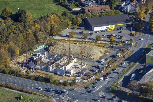 Aerial view, construction area and new building for Mensing Galerie corner Werler Straße and Unnaer Straße and in the district Rhynern in Hamm, Ruhr area, North Rhine-Westphalia, Germany, construction work, construction area, building site, building plots, construction project, construction site, DE, Europe, gallery, commercial enterprises, commercial area, commercial area, commercial location, commercial use, Hamm, culture, art, aerial view, aerial photography, aerial photography, new building, overview, bird's eye view, birds-eyes view, overview