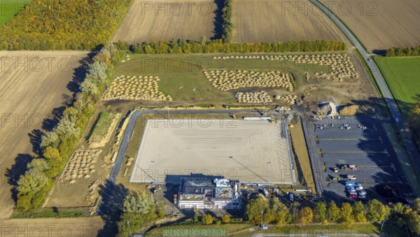 Aerial view, construction site and new sports field with stands and a club building with sports day care centre Papenloh An der Lohschule in the district Rhynern in Hamm, Ruhr area, North Rhine-Westphalia, Germany, Am Sportplatz, construction work, construction area, construction site, building plots, construction project, construction site, DE, Europe, Hamm, aerial view, aerial photography, aerial photography, SV Westfalia Rhynern, sports, sports facilities, sports field, sports facility, Tünner Berg, overview, bird's-eye view, overview
