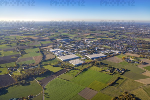 Aerial view, industrial park Rhynern between motorway A2 and federal road B63 in the district Rhynern in Hamm, Ruhr area, North Rhine-Westphalia, Germany, DE, Europe, distant view, commercial enterprises, commercial area, commercial park, commercial location, commercial use, Hamm, industrial area, industrial building, industrial location, aerial view, aerial photography, aerial photography, Netto Lager, Oberster Kamp, overview, bird's-eye view, birds-eyes view, overview