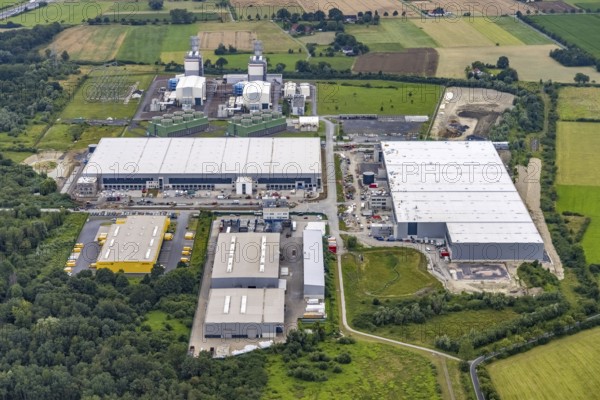 Aerial view, construction site and new building in DistributionPark Hamm, Trianelstraße and K'Park-Straße, two building complexes with offices and warehouses for logistics, Uentrop, Hamm, Ruhr area, North Rhine-Westphalia, Germany, DE, Europe, commercial enterprises, commercial area, business park, commercial location, commercial use, Hines Immobilien, industrial area, industrial building, industrial location, logistics, logistics service, logistics service provider, logistics provider, logistics centre, aerial view, aerial photography, aerial photography, transport service, overview, bird's-eye view, overview