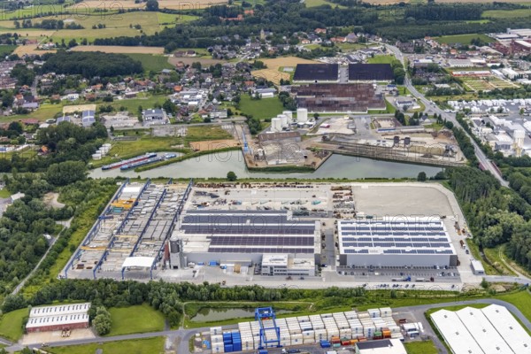 Aerial view, construction site and new building in DistributionPark Hamm, Trianelstraße and K'Park-Straße, Uentrop, Hamm, Ruhr area, North Rhine-Westphalia, Germany, DE, Europe, commercial enterprises, commercial area, commercial park, commercial location, commercial use, Hines Immobilien, industrial area, industrial building, industrial location, aerial view, aerial photography, aerial photography, photovoltaics, photovoltaic plant, solar, solar plant, solar roof, solar energy, overview, bird's-eye view, bird's-eye view, overview