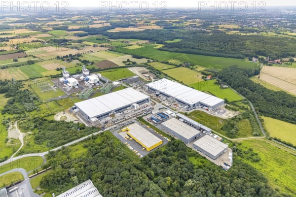 Aerial view, construction site and new building DistributionPark Hamm, Trianelstraße and K'Park-Straße, two building complexes with offices and warehouses for logistics, Deutsche Post DHL - Mech ZB Hamm, Uentrop, Hamm, Ruhr area, North Rhine-Westphalia, Germany, DE, Europe, commercial enterprises, commercial area, commercial park, commercial location, commercial use, Hines Immobilien, industrial area, industrial building, industrial location, logistics, logistics service, logistics service provider, logistics provider, logistics centre, aerial view, aerial photography, aerial photography, transport service, overview, bird's-eye view, overview