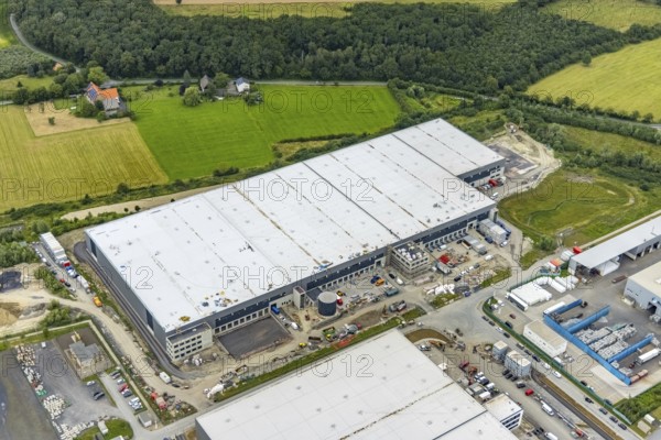 Aerial view, construction site and new building in DistributionPark Hamm, Trianelstraße and K'Park-Straße, two building complexes with offices and warehouses for logistics, Uentrop, Hamm, Ruhr area, North Rhine-Westphalia, Germany, DE, Europe, commercial enterprises, commercial area, business park, commercial location, commercial use, Hines Immobilien, industrial area, industrial building, industrial location, logistics, logistics service, logistics service provider, logistics provider, logistics centre, aerial view, aerial photography, aerial photography, transport service, overview, bird's-eye view, overview