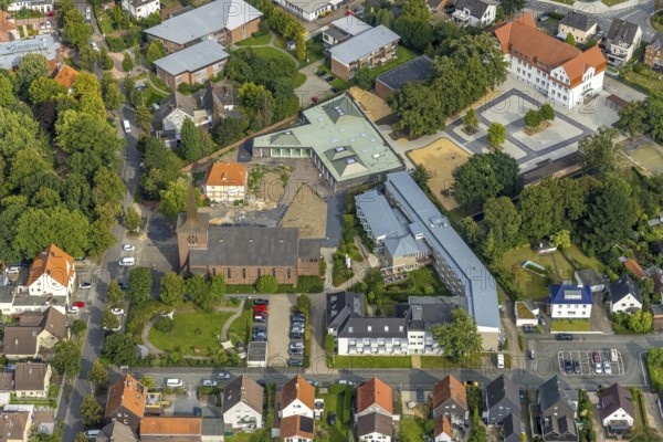 Aerial view, catholic Heilig Kreuz church and Caritas retirement home St. Josef in the district of Herringen in Hamm, Ruhr area, North Rhine-Westphalia, Germany, old people's home, retirement home, old people's home, place of worship, care and nursing, DE, Europe, religious community, place of worship, Hamm, holy place, church, parish, denomination, aerial view, aerial photography, aerial photography, care facility, religion, religious site, retirement home, retirement residence, retirement home, retirement centre, overview, bird's eye view, birds-eyes view, overview