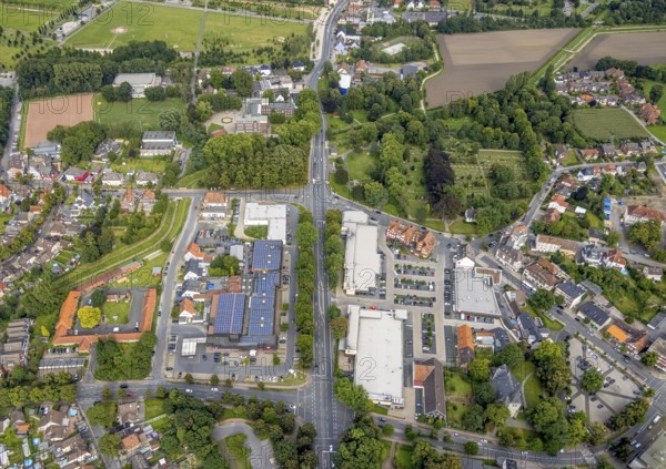 Aerial view, local supply centre with Rewe, Edeka and Aldi supermarket on Dortmunder Straße in Herringen, Hamm, Ruhr area, North Rhine-Westphalia, Germany, DE, Europe, aerial view, aerial photography, aerial photography, local supply centre, photovoltaic, photovoltaic system, solar, solar system, solar roof, solar energy, overview, bird's-eye view, bird's-eye view, overview