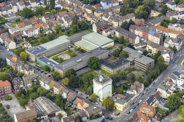 Aerial view, construction site and renovation Friedrich-List-Berufskolleg Hamm and Eduard-Spranger-Berufskolleg and HochBunker Vorheider Weg in Mitte, Hamm, Ruhr area, North Rhine-Westphalia, Germany, construction work, construction area, construction site, construction project, construction site, vocational school, education, educational institution, bunker, DE, Europe, educational institute, aerial view, aerial photography, aerial photography, renovation, refurbishment, school, tower, overview, bird's-eye view, overview