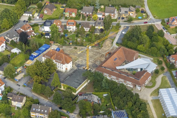 Aerial view, construction site with extension of the Falkschule / Arnold-Freymuth-Gesamtschule in Herringen, Hamm, Ruhr area, North Rhine-Westphalia, Germany, construction work, construction area, building site, building plots, construction measure, construction project, construction site, education, educational institution, DE, Europe, comprehensive school, capacity requirement, teaching institute, aerial view, aerial photography, aerial photography, school, overview, bird's-eye view, bird's-eye view, overview
