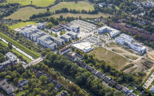 Aerial view, Hamm-Lippstadt University of Applied Sciences and the construction site at SCI:Q Science Quarter in the Mitte district of Hamm, Ruhr area, North Rhine-Westphalia, Germany, construction work, building, construction area, building site, building plots, construction project, construction site, education, educational institution, DE, Europe, aircraft, business park, property tax, Hamm, real estate, industrial area, aerial photograph, aerial photography, aerial photography, Marker Allee, Rhine-Ruhr metropolitan region, new building, Paracelsuspark, Science Quarter Hamm, sailor, tech park, overview, university, bird's-eye view, science quarter, residential complex, living and living, residential area, residential buildings, residential quality, residential quarter, housing estate, birds-eyes view, overview