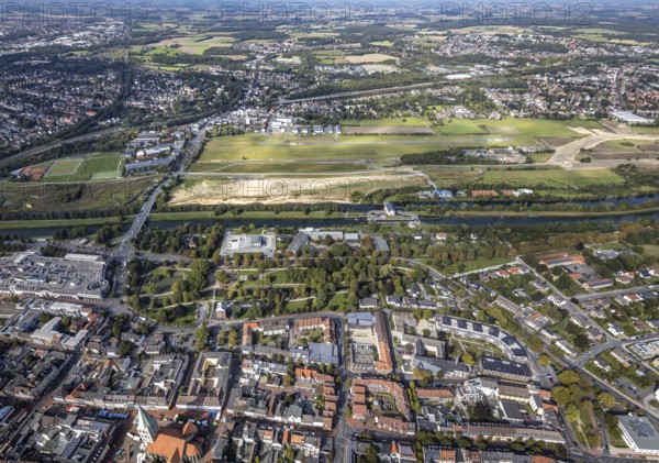 Aerial view, Hamm airfield and construction site for the Lippe floodplain project on the river Lippe and Datteln-Hamm canal with city centre view in the district of Heessen in Hamm, Ruhr area, North Rhine-Westphalia, Germany, construction work, construction area, construction site, building plots, construction project, construction site, DE, Europe, airfield, Hamm, runway, aerial view, aerial photography, aerial photography, runway, overview, bird's eye view, birds-eyes view, overview