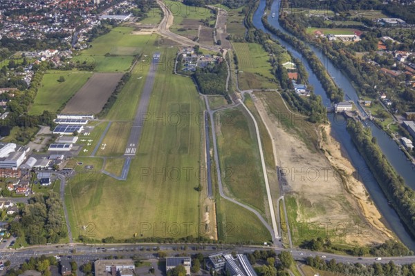 Aerial view, Hamm airfield and construction site for the Lippe floodplain experience project on the River Lippe and Datteln-Hamm Canal in the Heessen district of Hamm, Ruhr area, North Rhine-Westphalia, Germany, construction work, construction area, construction site, building plots, construction project, construction site, DE, Europe, airfield, Hamm, runway, aerial view, aerial photography, aerial photography, runway, overview, bird's-eye view, overview