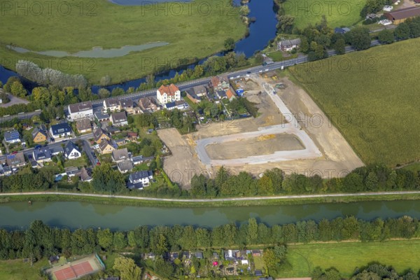 Aerial view, construction site and new construction for residential buildings Im Fuchswinkel on Lippestraße in the Uentrop district of Hamm, Ruhr area, North Rhine-Westphalia, Germany, construction work, construction area, building site, building plots, construction project, construction site, DE, Europe, river Lippe, property tax, Hamm, real estate, aerial view, aerial photography, aerial photography, overview, bird's-eye view, residential complex, living and living, residential area, residential buildings, residential quality, residential neighbourhood, residential estate, birds-eyes view, overview