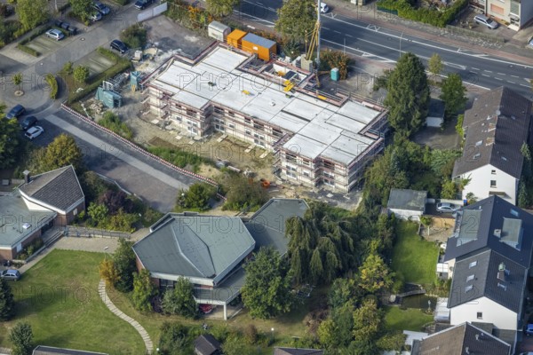 Aerial view, construction site and new construction of senior citizens' flats Alter Uentroper Weg as well as Amalie-Sieveking-Haus and Friedrich-von-Bodelschwingh-Haus parish in the Uentrop district of Hamm, Ruhr area, North Rhine-Westphalia, Germany, retirement home, place of worship, construction work, construction area, building site, building plots, construction, construction project, construction site, care and nursing, DE, Europe, religious community, place of worship, Hamm, holy place, church, parish, denomination, aerial view, aerial photography, aerial photography, new building, care facility, religion, religious site, overview, bird's-eye view, overview