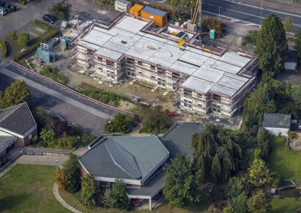 Aerial view, construction site and new construction of senior citizens' flats Alter Uentroper Weg as well as Amalie-Sieveking-Haus and Friedrich-von-Bodelschwingh-Haus parish in the Uentrop district of Hamm, Ruhr area, North Rhine-Westphalia, Germany, retirement home, place of worship, construction work, construction area, building site, building plots, construction, construction project, construction site, care and nursing, DE, Europe, religious community, place of worship, Hamm, holy place, church, parish, denomination, aerial view, aerial photography, aerial photography, new building, care facility, religion, religious site, overview, bird's-eye view, overview