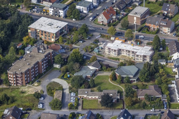 Aerial view, construction site and new construction of senior citizens' flats Alter Uentroper Weg as well as Amalie-Sieveking-Haus and Friedrich-von-Bodelschwingh-Haus parish in the Uentrop district of Hamm, Ruhr area, North Rhine-Westphalia, Germany, retirement home, place of worship, construction work, construction area, building site, building plots, construction, construction project, construction site, care and nursing, DE, Europe, religious community, place of worship, Hamm, holy place, church, parish, denomination, aerial view, aerial photography, aerial photography, new building, care facility, religion, religious site, overview, bird's-eye view, overview