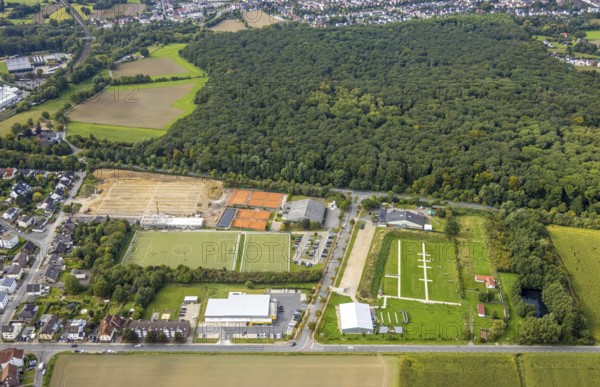 Aerial view, construction site at the Hammer SC sports facility between Hubert-Westermeier-Straße and In der Fuchshöhle in the Rhynern district of Hamm, Ruhr area, North Rhine-Westphalia, Germany, construction work, construction area, building site, building plots, construction project, construction site, DE, Europe, football pitch, football stadium, football club, Hamm, aerial view, aerial photography, aerial photography, sports facilities, sports field, sports facility, stadium, overview, bird's eye view, birds-eyes view, overview