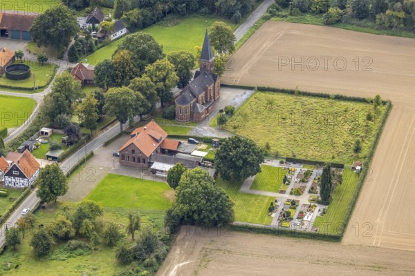 Aerial view, St. Joseph's Catholic Church and cemetery in Süddinker in the Rhynern district of Hamm, Ruhr area, North Rhine-Westphalia, Germany, place of worship, burial site, DE, Europe, cemetery, memorial, religious community, place of worship, graves, burial ground, Hamm, sacred site, church, parish, denomination, aerial photograph, aerial photography, aerial photography, religion, religious site, resting place, overview, bird's eye view, bird's eye view, overview