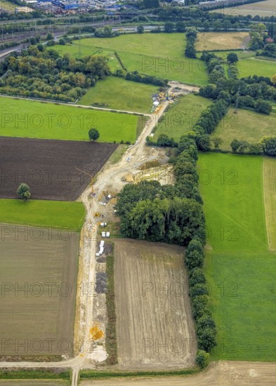 Aerial view, construction site for wind turbines between Kamener Straße and Rathenaustraße in the district Pelkum in Hamm, Ruhr area, North Rhine-Westphalia, Germany, construction work, construction area, construction site, building plot, construction project, construction site, DE, Europe, Hamm, aerial view, aerial photography, aerial photography, overview, bird's eye view, WEA, wind energy, wind turbine, wind power, wind power plant, wind turbines, birds-eyes view, overview