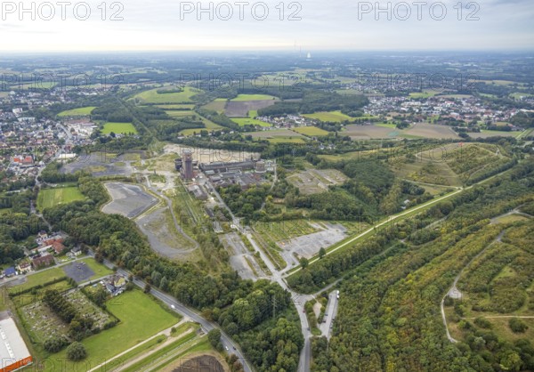Aerial view, former Ost colliery Heinrich Robert colliery with hammer tower in the district Herringen in Hamm, Ruhr area, North Rhine-Westphalia, Germany, mine, Heinrich Robert colliery, DE, Europe, commercial enterprises, commercial area, commercial park, commercial location, commercial use, Hamm, industrial plant, industrial area, industrial building, industrial site, aerial view, aerial photography, aerial photography, Rhine-Ruhr metropolitan region, coal mine, tower, overview, bird's-eye view, birds-eyes view, former Ost colliery, historical, historical site, overview, destroyed building