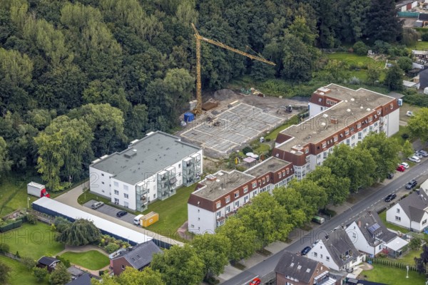 Aerial view, construction site at Wolfgang-Glaubitz-Seniorenzentrum am Westberger Weg in the district of Heessen in Hamm, Ruhr area, North Rhine-Westphalia, Germany, retirement home, old people's home, construction work, construction area, building site, building plots, construction measure, construction project, construction site, care and nursing, DE, Europe, Hamm, aerial view, aerial photography, aerial photography, new building, care facility, retirement home, retirement residence, retirement home, senior citizens' centre, overview, bird's eye view, overview