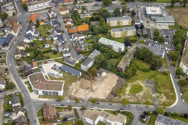 Aerial view, construction area and new construction flats in the urban renewal area on Waldenburger Straße in the Herringen district of Hamm, Ruhr area, North Rhine-Westphalia, Germany, construction work, construction, construction area, building site, building plots, construction project, construction site, DE, development, Europe, property tax, Hamm, real estate, capacity requirements, aerial view, aerial photography, aerial photography, new build, overview, bird's-eye view, growth, housing estate, housing and living, residential area, residential buildings, residential neighbourhood, housing estate, birds-eyes view, overview