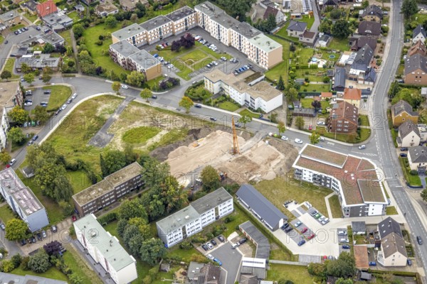 Aerial view, construction area and new construction flats in the urban renewal area on Waldenburger Straße in the Herringen district of Hamm, Ruhr area, North Rhine-Westphalia, Germany, construction work, construction, construction area, building site, building plots, construction project, construction site, DE, development, Europe, property tax, Hamm, real estate, capacity requirements, aerial view, aerial photography, aerial photography, new build, overview, bird's-eye view, growth, housing estate, housing and living, residential area, residential buildings, residential neighbourhood, housing estate, birds-eyes view, overview