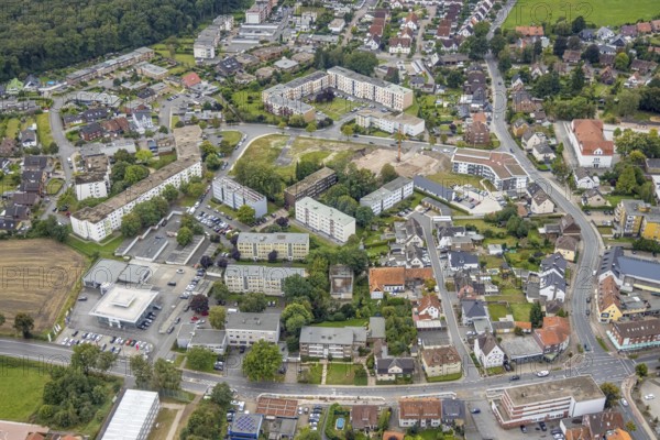 Aerial view, construction area and new construction flats in the urban renewal area on Waldenburger Straße in the Herringen district of Hamm, Ruhr area, North Rhine-Westphalia, Germany, construction work, construction, construction area, building site, building plots, construction project, construction site, DE, development, Europe, property tax, Hamm, real estate, capacity requirements, aerial view, aerial photography, aerial photography, new build, overview, bird's-eye view, growth, housing estate, housing and living, residential area, residential buildings, residential neighbourhood, housing estate, birds-eyes view, overview