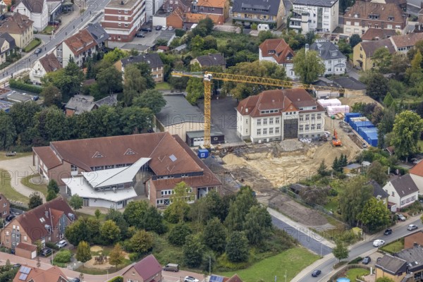 Aerial view, construction site with extension of the Falkschule / Arnold-Freymuth-Gesamtschule in the district Herringen in Hamm, Ruhr area, North Rhine-Westphalia, Germany, construction work, construction area, building site, building plots, construction measure, construction project, construction site, education, educational institution, DE, Europe, Hamm, educational institute, aerial view, aerial photography, aerial photography, school, overview, bird's-eye view, overview